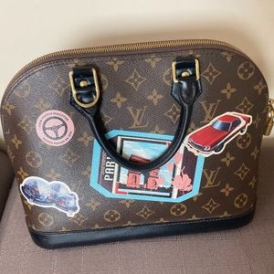 Louis Vuitton Monogram World Tour Alma PM Bag